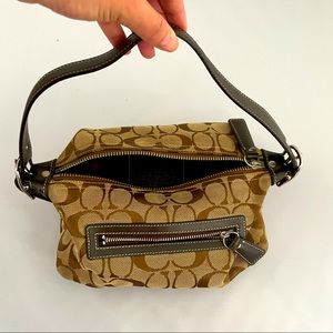 Lightly used brown classic Coach bag